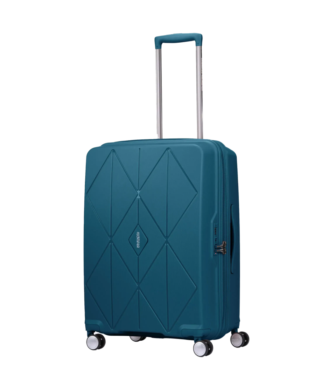 Angled view of the American Tourister Argyle medium hard suitcase in Deep Teal, with geometric design, TSA lock, and spinner wheels Available Online