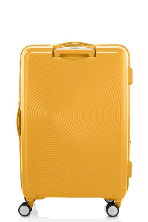 Back view of the American Tourister Curio Book Opening hard luggage spinner in Yellow, showcasing its iconic concentric circle "ripple" design on a durable polypropylene shell. Find Now Online