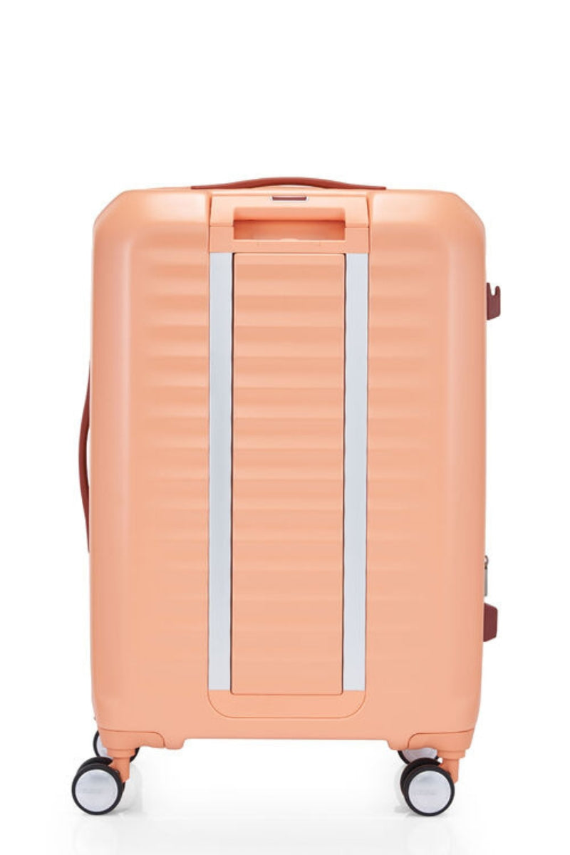 Back view of the American Tourister Frontec Spinner in Apricot Blush, showcasing its unique vertical front-access door and clean, contemporary lines. Available for Online Purchase
