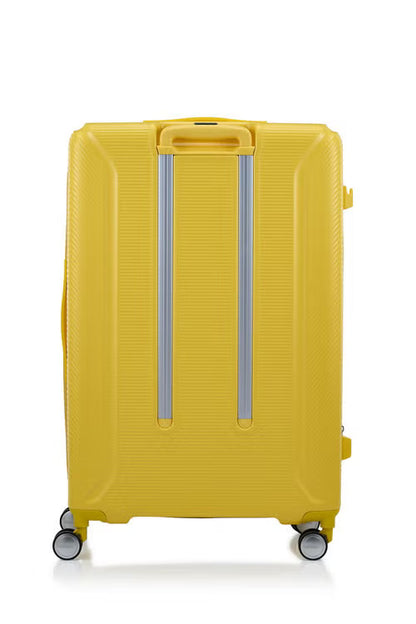 Back view of the American Tourister Robotech spinner hard luggage in Citron Yellow, showing the sleek textured hardshell and robust double wheels. Shop Online