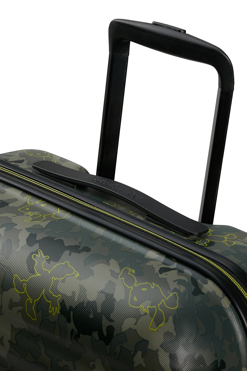 Close-up Handle view of the American Tourister Disney Wavebreaker in Donald Duck Camo, showcasing the green camouflage pattern with subtle Donald Duck silhouettes.. Shop Now Online