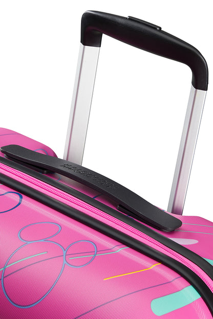 Close-up handle view of the American Tourister Disney Wavebreaker spinner in Pink, showing the expandable and carry handles. Find Now Online
