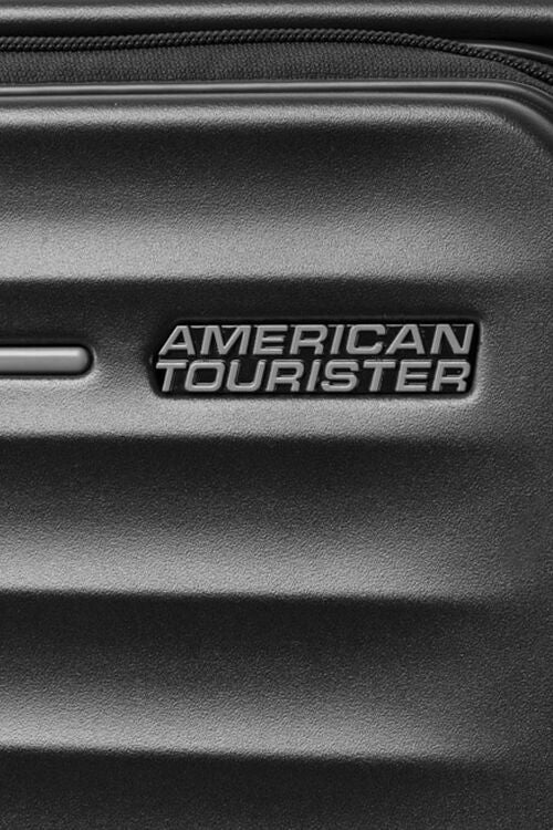 Close-up view of the American Tourister Frontec Spinner in Black, showcasing the brand name. Available for Online Purchase