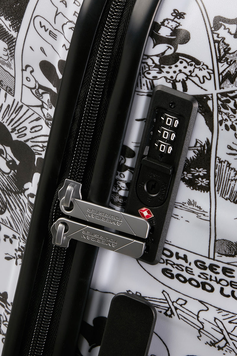 Close-up view of the integrated TSA-approved combination lock, keeping the Disney-themed zippers securely in place. Available Online