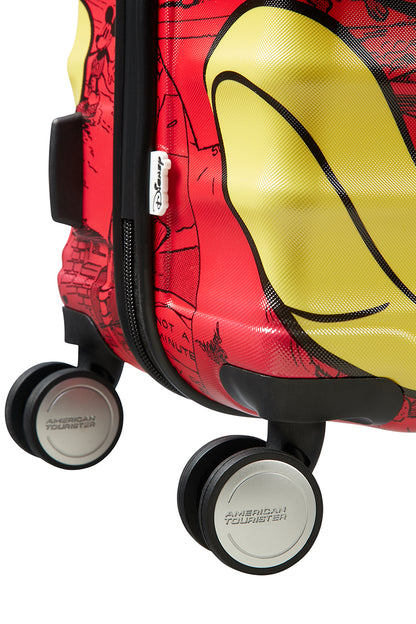 Close-up view of the spinner wheels of the American Tourister Disney Wavebreaker Mickey Comics Red spinner, featuring bright red hubcaps that match the suitcase's comic-inspired color scheme.