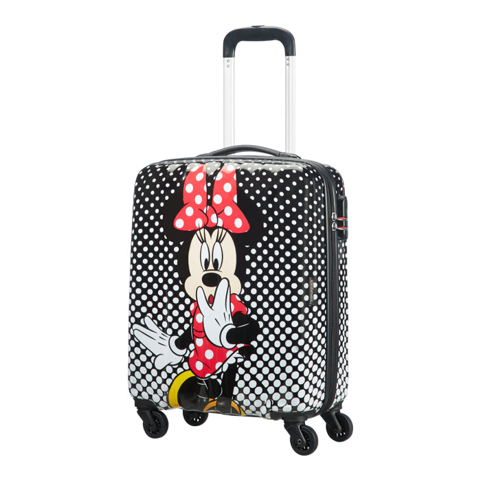 Front view of the American Tourister Disney Legends Cabin spinner luggage, featuring a classic, high-gloss polka dot Minnie Mouse design with a bright red bow. Shop Now Online
