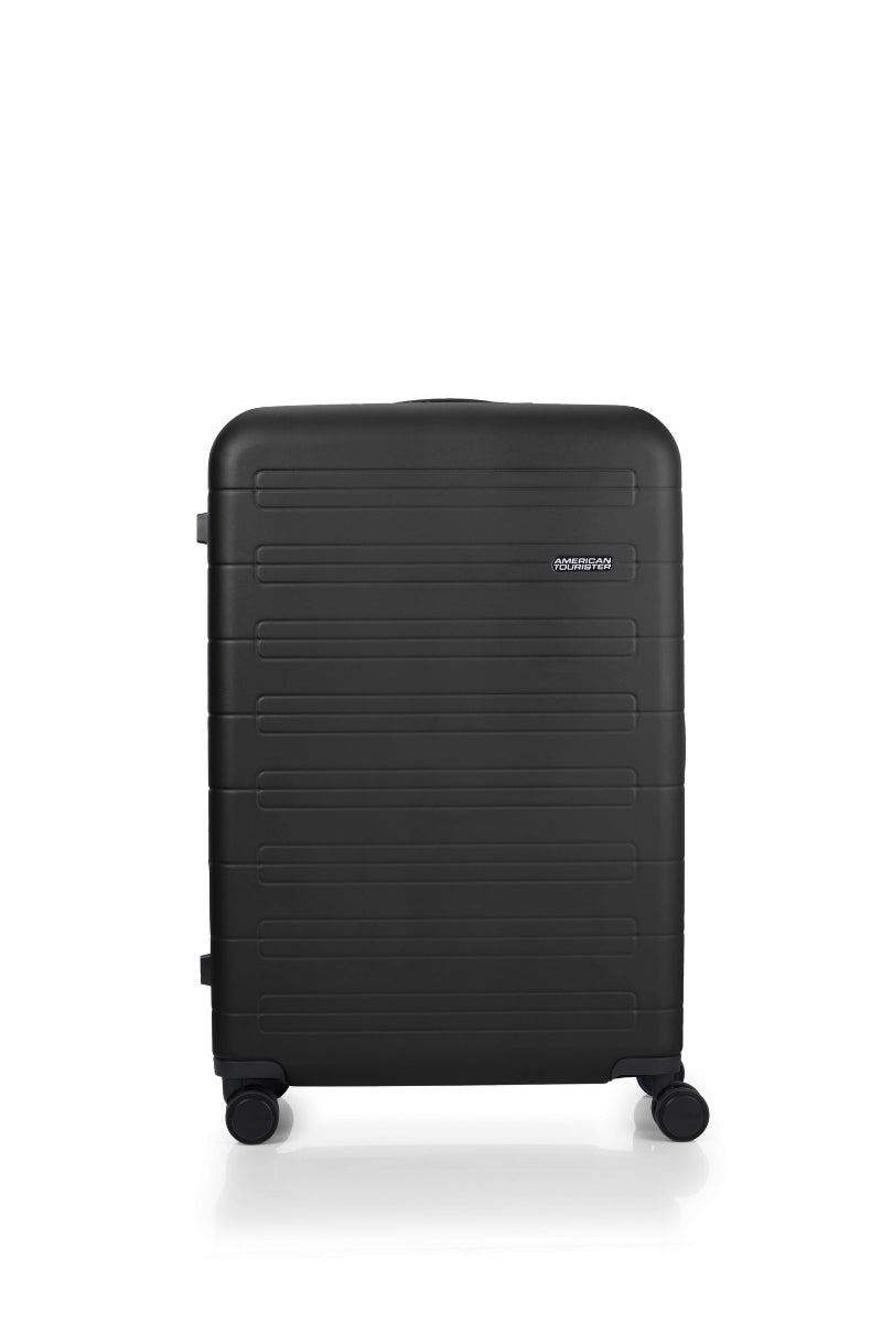 Front view of the American Tourister Novastream Medium hard suitcase Luggage in Dark Slate, with ribbed design, TSA lock, and spinner wheels. Order Online Today