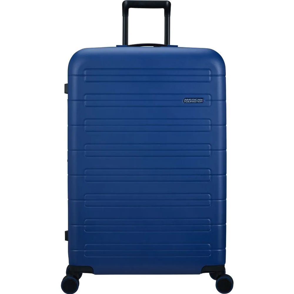 Front view of the American Tourister Novastream hard suitcase Luggage in Navy Blue, with ribbed design, TSA lock, and spinner wheels. Order Online Today