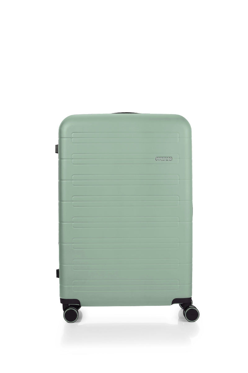 Front view of the American Tourister Novastream hard suitcase Luggage in Nomad Green, with ribbed design, TSA lock, and spinner wheels. Order Online Today