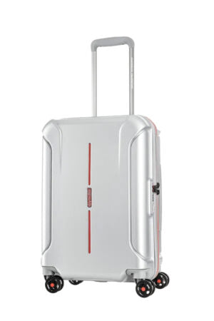 Front view of the American Tourister Technum Spinner cabin in Aluminum, highlighting its modern industrial texture and bold, boxy hardshell design. Shop the Latest Online