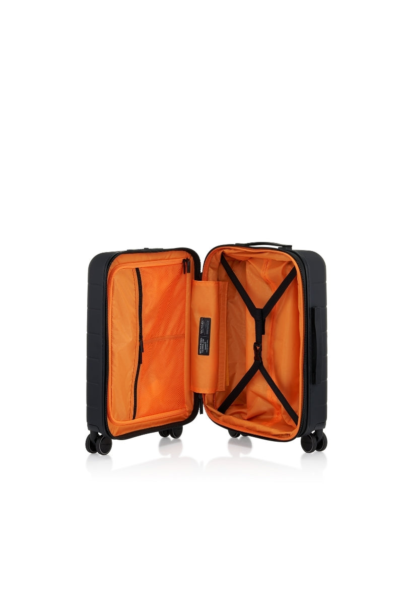 Inside view of the opened American Tourister Novastream Cabin hard suitcase Luggage in Dark Slate, with ribbed design, TSA lock, and spinner wheels. Order Online Today
