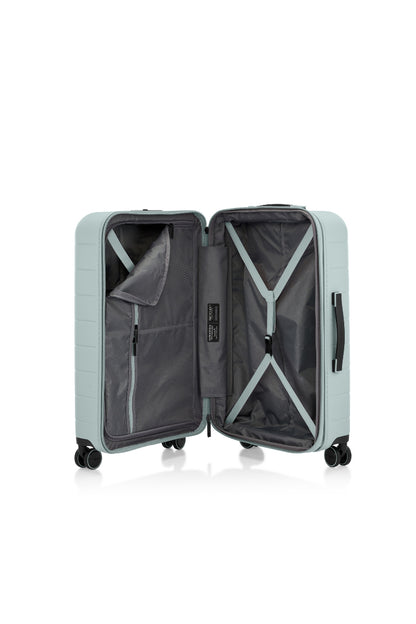 Inside view of the opened American Tourister Novastream hard suitcase Luggage in Nomad Green, with ribbed design, TSA lock, and spinner wheels. Order Online Today