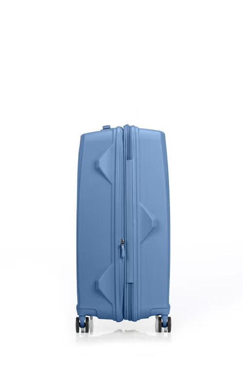 Other side view of the American Tourister Argyle hard suitcase in Blue Slate, with geometric design, TSA lock, and spinner wheels Available Online