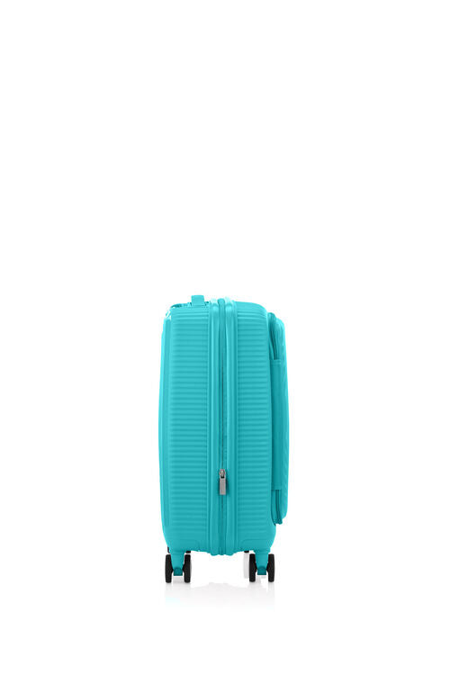 Other side view of the American Tourister Curio Book Opening hard luggage spinner in Turquoise, showcasing the zippers and the durable polypropylene shell. Find Now Online