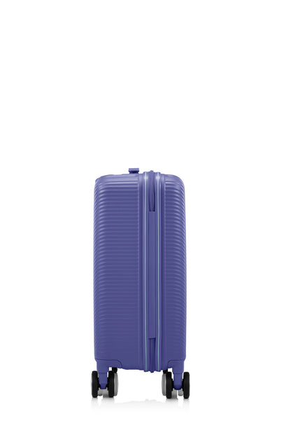 Other side view of the American Tourister Robotech spinner hard luggage in Future Dusk, showing the sleek textured hardshell and robust double wheels. Shop Online