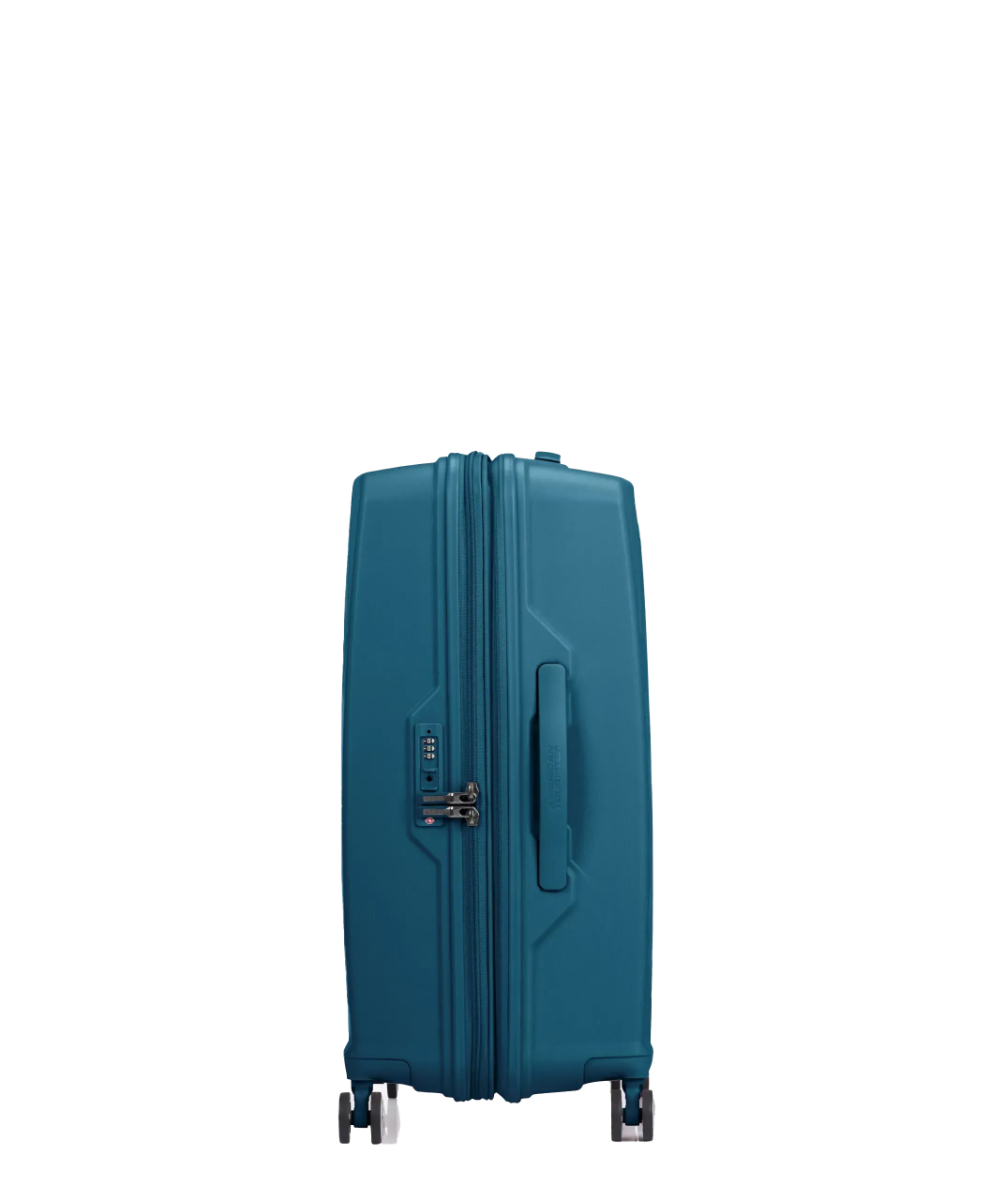 Side view of the American Tourister Argyle cabin hard suitcase in Deep Teal, with geometric design, TSA lock, and spinner wheels Available Online