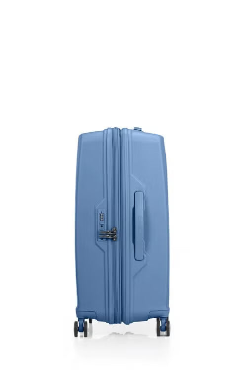 Side view of the American Tourister Argyle hard suitcase in Blue Slate, with geometric design, TSA lock, and spinner wheels Available Online