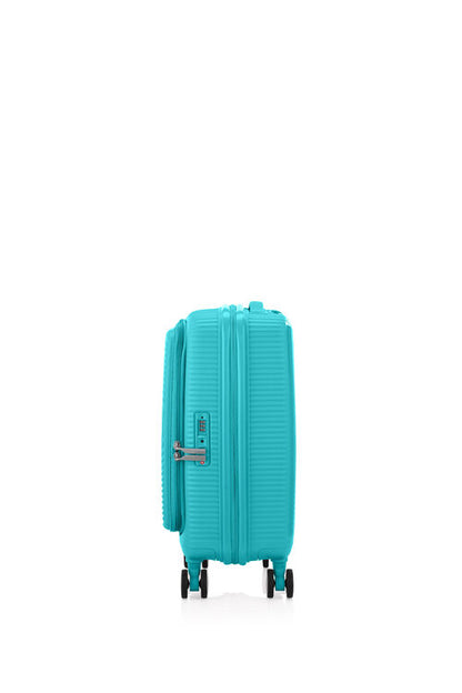 Side view of the American Tourister Curio Book Opening hard luggage spinner in Turquoise, showcasing the zippers and the durable polypropylene shell. Find Now Online