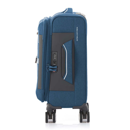 Side view of the American Tourister Droyce soft-shell spinner in Navy, featuring a modern dip-dye color gradient, grey accents, and a distinctive metal logo. Shop Now Online